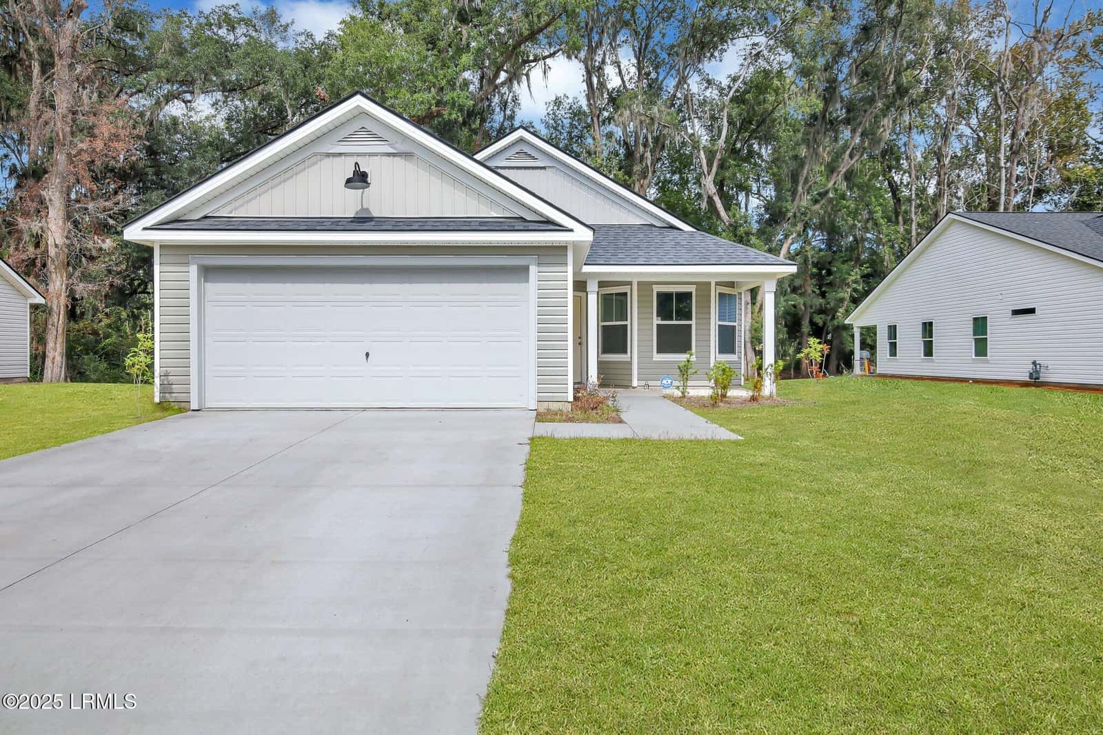 117 Teal Bluff Boulevard, Seabrook, SC 29940 — photo 1 of 23