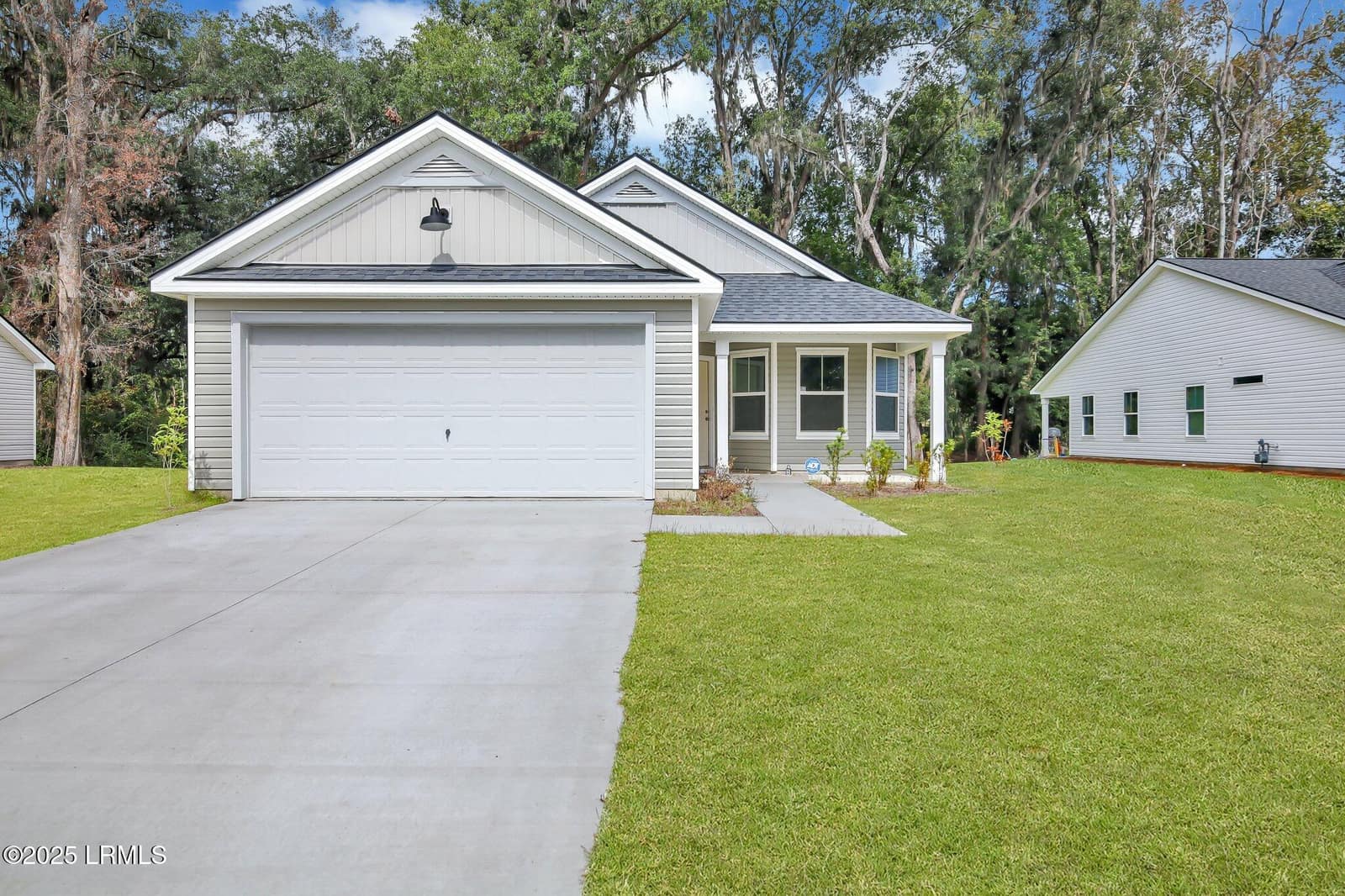 117 Teal Bluff Boulevard, Seabrook, SC 29940 — photo 1 of 23