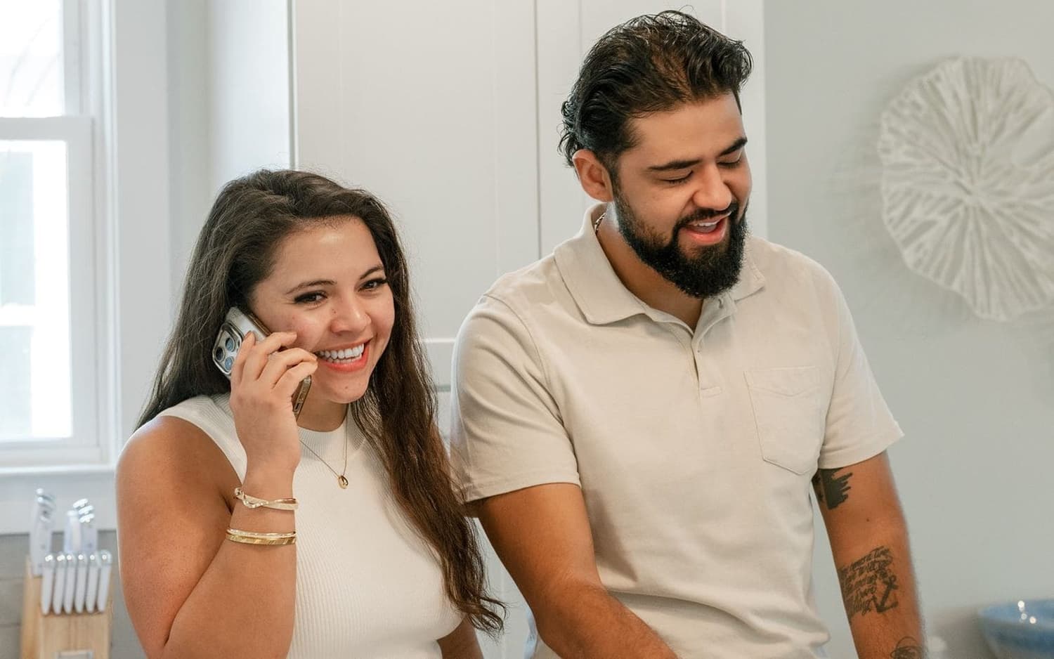 Faris Group buyer agents working a deal together in a Lowcountry kitchen